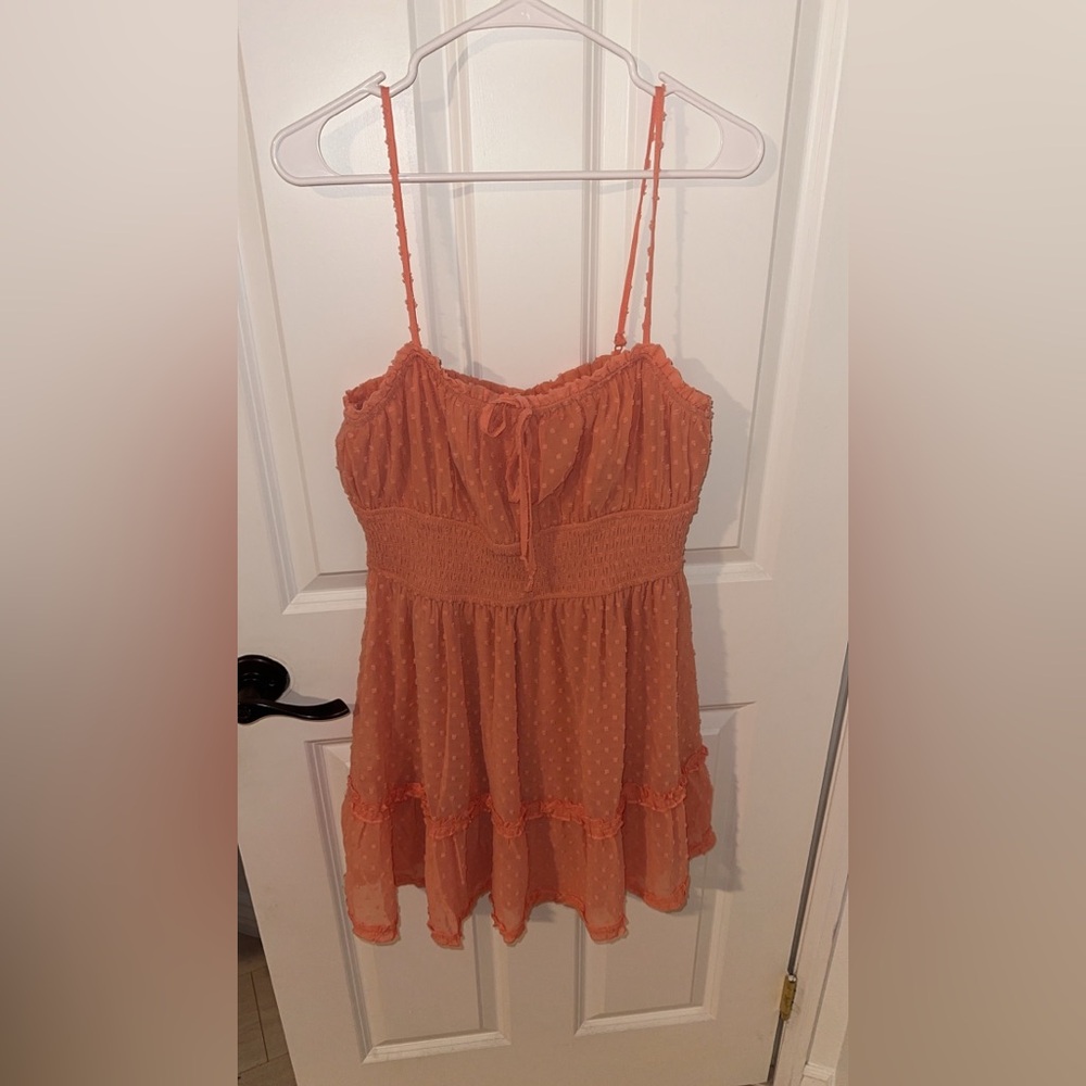 Francesca’s orange summer dress